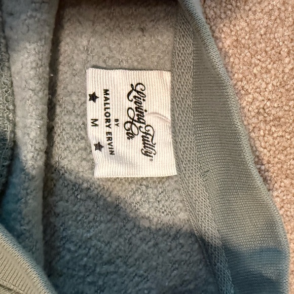 Women's Blue Sweatshirt with Red Bow Design - Picture 3 of 3